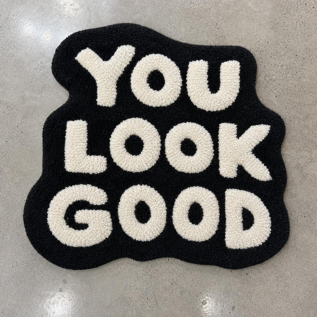 Custom tufted lettering rug